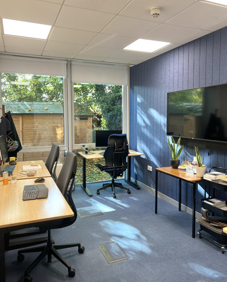 Empty office with desks and plants